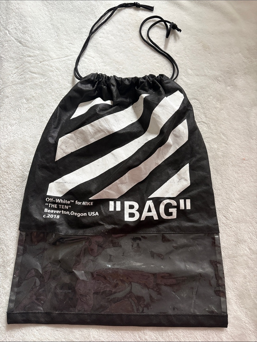 Reusable off-white draw strip bag